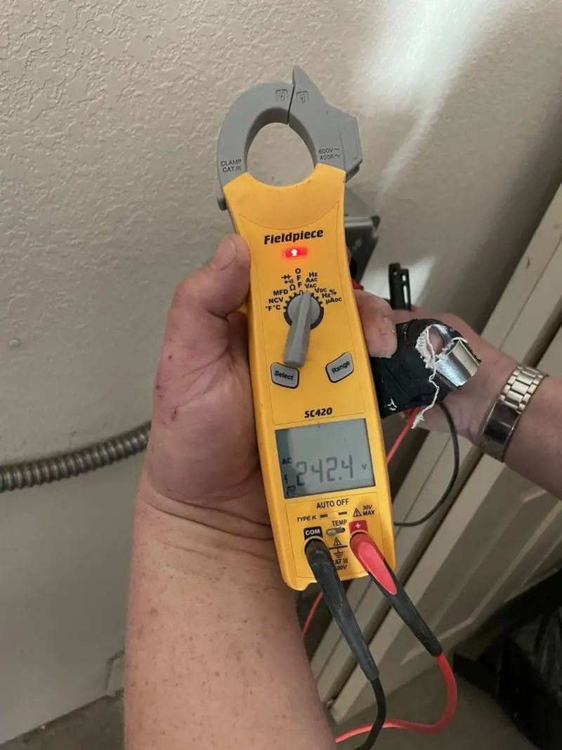 Voltage testing with clamp meter during Outlet Installation in Copperas Cove